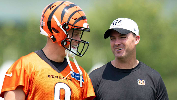 Cincinnati Bengals quarterback Joe Burrow (9) talks with Cincinnati Bengals head coach Zac Taylor during Cincinnati Bengals training camp in Cincinnati on Friday, July 26, 2024.