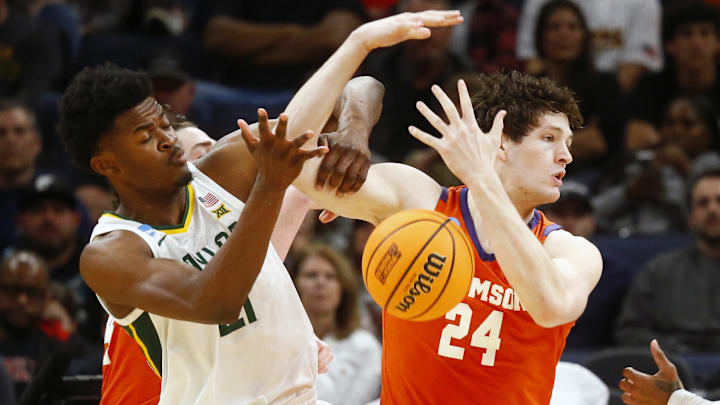 Mar 24, 2024; Memphis, TN, USA; Clemson Tigers center PJ Hall (24) and Baylor Bears center Yves Mar 24, 2024; Memphis, TN, USA; Clemson Tigers center PJ Hall (24) and Baylor Bears center Yves