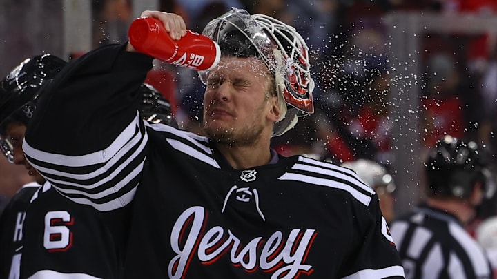 Dec 23, 2023; Newark, New Jersey, USA; New Jersey Devils goaltender Vitek Vanecek (41) sprays water