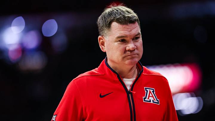 Dec 29, 2025; Tucson, Arizona, USA; Arizona Wildcats head coach Tommy Lloyd walks down the court during the first half of the game at McKale Memorial Center. Dec 29, 2025; Tucson, Arizona, USA; Arizona Wildcats head coach Tommy Lloyd walks down the court during the first half of the game at McKale Memorial Center.