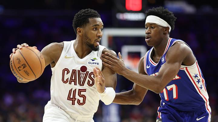 Jan 14, 2026; Philadelphia, Pennsylvania, USA; Cleveland Cavaliers guard Donovan Mitchell (45) drives against Philadelphia 76ers guard Vj Edgecombe (77) during the third quarter at Xfinity Mobile Arena. Mandatory Credit: Bill Streicher-Imagn Images Jan 14, 2026; Philadelphia, Pennsylvania, USA; Cleveland Cavaliers guard Donovan Mitchell (45) drives against Philadelphia 76ers guard Vj Edgecombe (77) during the third quarter at Xfinity Mobile Arena. Mandatory Credit: Bill Streicher-Imagn Images