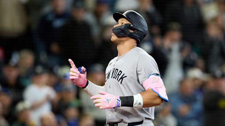 May 14, 2025; Seattle, Washington, USA; New York Yankees designated hitter Aaron Judge (99) hits a solo home run off Seattle Mariners pitcher Carlos Vargas (not pictured) during the eighth inning at T-Mobile Park. Mandatory Credit: John Froschauer-Imagn Images