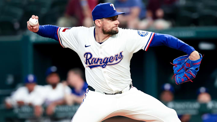 May 27, 2025; Arlington, Texas, USA; Texas Rangers starting pitcher Nathan Eovaldi (17) throws during the first inning against the Toronto Blue Jays at Globe Life Field. Mandatory Credit: Kevin Jairaj-Imagn Images