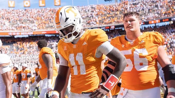 Sep 26, 2026; Knoxville, Tennessee, USA; Tennessee quarterback Faizon Brandon (11) walks off the field after a college football game between Tennessee and Texas at Neyland Stadium in Knoxville, Tenn. on Sept. 26, 2026. Mandatory Credit: Brianna Paciorka-USA TODAY Network via Imagn Images