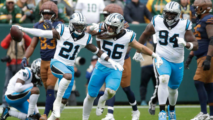 Carolina Panthers safety Nick Scott (21) celebrates recovering a fumble by Green Bay Packers wide receiver Savion Williams (83) during their football game Sunday, November 2, 2025, at Lambeau Field in Green Bay, Wisconsin.