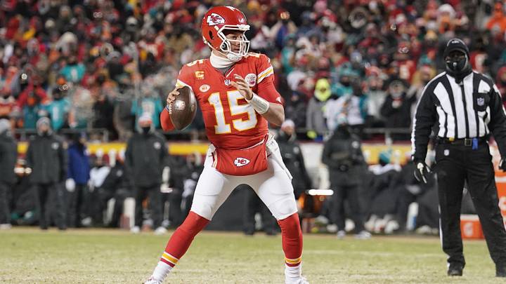 Jan 13, 2024; Kansas City, Missouri, USA; Kansas City Chiefs quarterback Patrick Mahomes (15) drops back to pass against the Miami Dolphins during the second half of the 2024 AFC wild card game at GEHA Field at Arrowhead Stadium. Mandatory Credit: Denny Medley-USA TODAY Sports