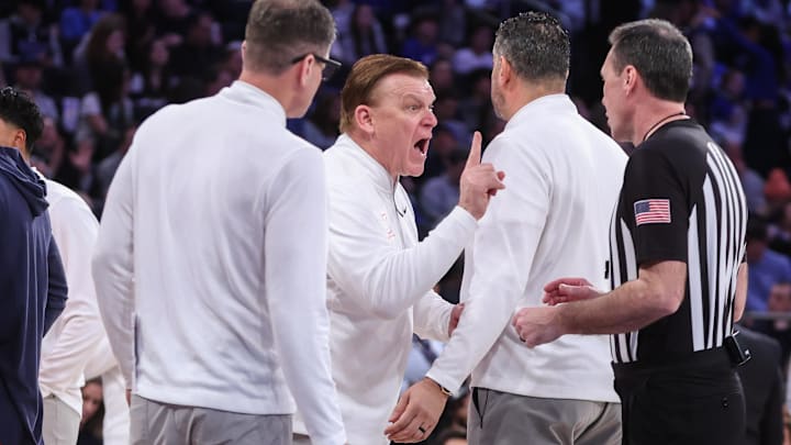 Feb 22, 2025; New York, NY, USA;  Illinois Fighting Illini head coach Brad Underwood argues with an official in the first half against the Duke Blue Devils at Madison Square Garden. Mandatory Credit: Wendell Cruz-Imagn Images