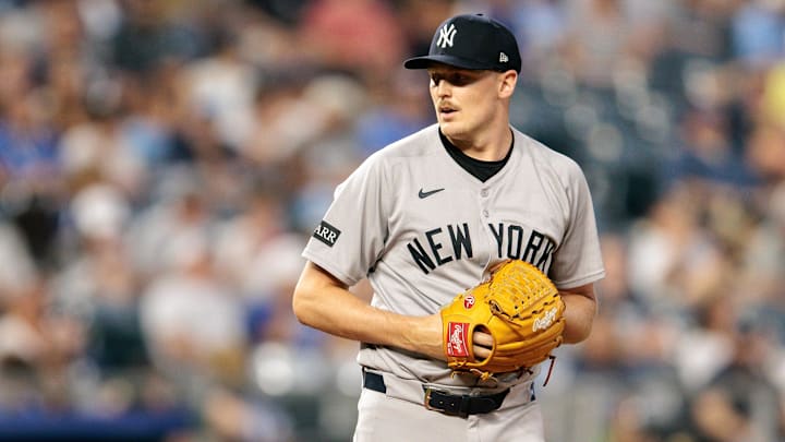 Jun 11, 2025; Kansas City, Missouri, USA; New York Yankees pitcher Brent Headrick (47) pitches during the seventh inning against the Kansas City Royals  at Kauffman Stadium. Mandatory Credit: William Purnell-Imagn Images