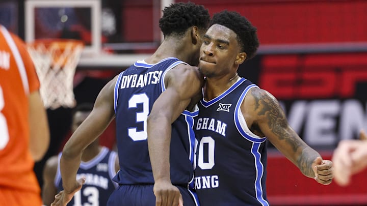 Nov 27, 2025; Kissimmee, Florida, USA; Brigham Young University Cougars forward AJ Dybantsa (3) and forward Kennard Davis Jr (30) react  during a time out against the Miami (FL) Hurricanes in the second half at State Farm Field House. Mandatory Credit: Nathan Ray Seebeck-Imagn Images