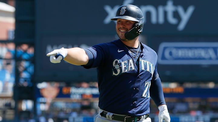 Ty France of the Seattle Mariners points to the dugout during a game against the Detroit Tigers