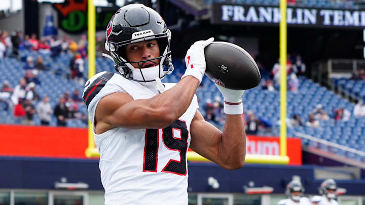 Houston Texans wide receiver Xavier Hutchinson (19) warms up prior to the game against the New England Patriots at Gillette Stadium.