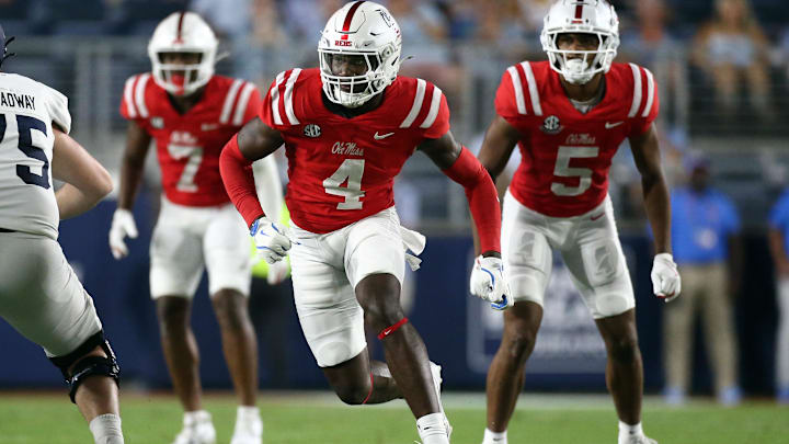 Sep 21, 2024; Oxford, Mississippi, USA; Mississippi Rebels linebacker Suntarine Perkins (4) rushes during the first half against the Georgia Southern Eagles at Vaught-Hemingway Stadium. Mandatory Credit: Petre Thomas-Imagn Images Sep 21, 2024; Oxford, Mississippi, USA; Mississippi Rebels linebacker Suntarine Perkins (4) rushes during the first half against the Georgia Southern Eagles at Vaught-Hemingway Stadium. Mandatory Credit: Petre Thomas-Imagn Images