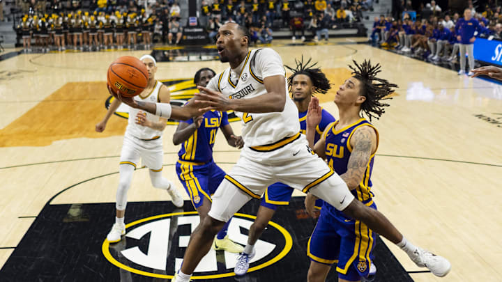 Jan 7, 2025; Columbia, Missouri, USA; Missouri Tigers guard Tamar Bates (2) shoots against the LSU Tigers during the second half at Mizzou Arena. Mandatory Credit: Jay Biggerstaff-Imagn Images