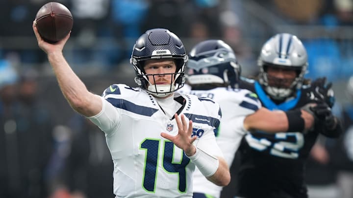 Seattle Seahawks quarterback Sam Darnold (14) throws a pass against the Carolina Panthers during the fourth quarter.