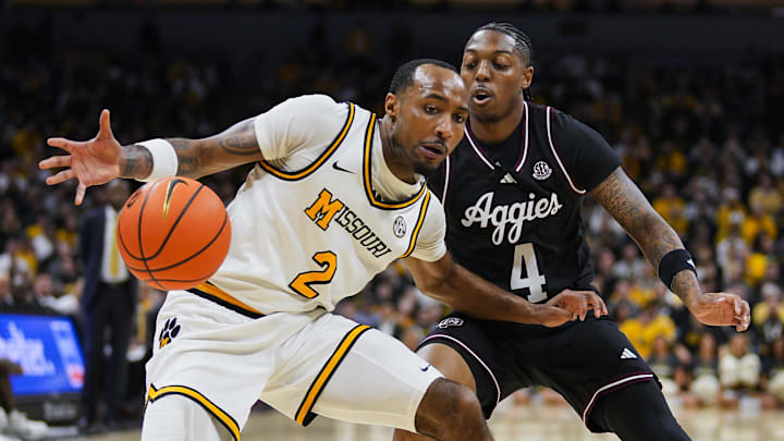 Missouri Tigers guard Tamar Bates (2) loses control of the ball in a game versus the Texas A&M Aggies this season.