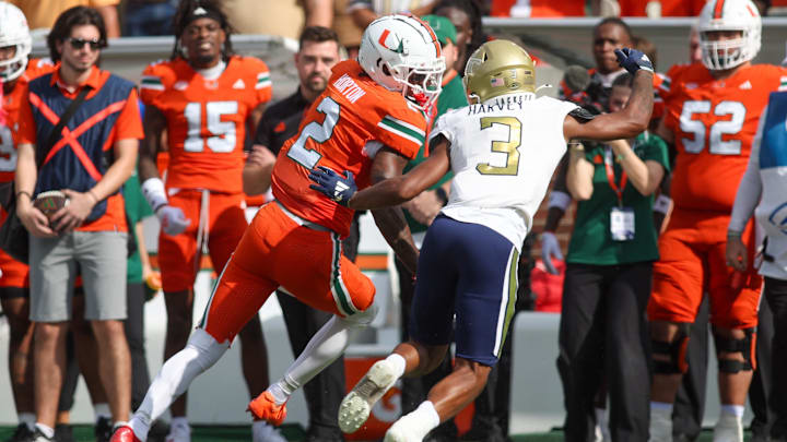 Nov 9, 2024; Atlanta, Georgia, USA; Miami Hurricanes wide receiver Isaiah Horton (2) is pushed out of bounds by Georgia Tech Yellow Jackets defensive back Ahmari Harvey (3) in the second quarter at Bobby Dodd Stadium at Hyundai Field. Mandatory Credit: Brett Davis-Imagn Images