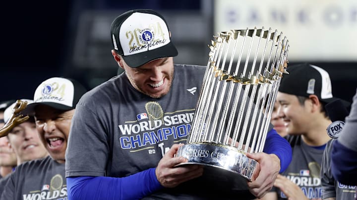 Freddie Freeman celebrates with his team after the Los Angeles Dodgers defeated the New York Yankees in Game 5 to clinch the 2024 World Series.
