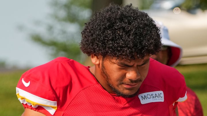 Jul 26, 2024; Kansas City, MO, USA; Kansas City Chiefs offensive tackle Kingsley Suamataia (76) walks from the locker room to the fields prior to training camp at Missouri Western State University. Mandatory Credit: Denny Medley-Imagn Images