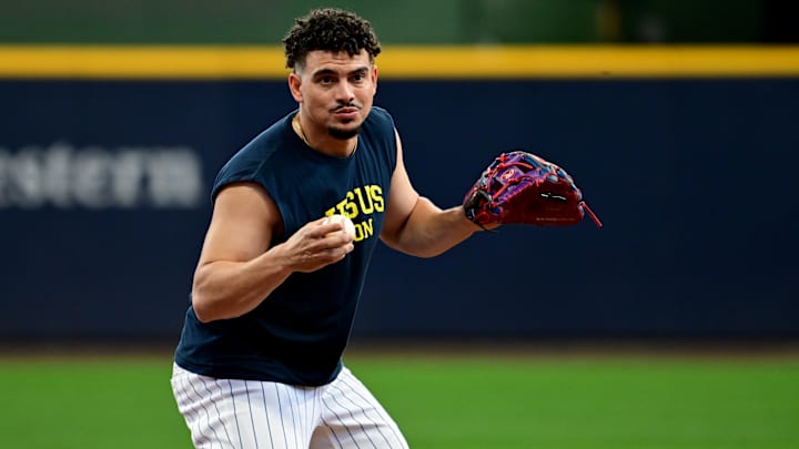 Oct 2, 2024; Milwaukee, Wisconsin, USA; Milwaukee Brewers shortstop Willy Adames (27) warms up before game two of the Wildcard round for the 2024 MLB Playoffs against the New York Mets at American Family Field. Mandatory Credit: Benny Sieu-Imagn Images