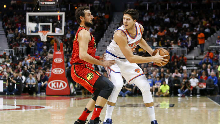Nov 24, 2017; Atlanta, GA, USA; New York Knicks forward Doug McDermott (20) dribbles against Atlanta Hawks guard Marco Belinelli (3) in the second quarter at Philips Arena. Mandatory Credit: Brett Davis-USA TODAY Sports
