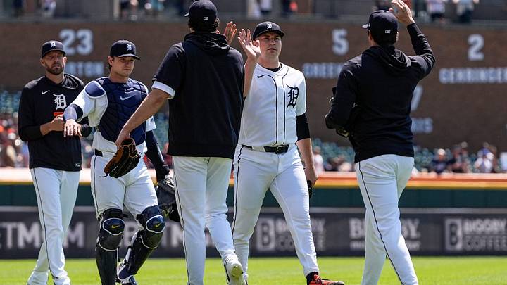 Detroit Tigers pitcher Tarik Skubal (29) high-fives teammates after warm up before first pitch against Milwaukee Brewers at Comerica Park in Detroit on Thursday, April 23, 2026.