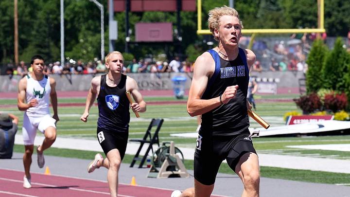 Waukesha West High School junior Cole Zielinski leads the pack as he gets near the finish line in the Division 1 boys 4x200 relay final during the WIAA State Track and Field meet in La Crosse, Wisconsin on Saturday, June 6, 2026.