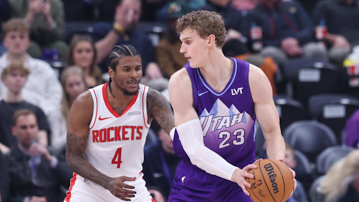 Feb 22, 2025; Salt Lake City, Utah, USA; Utah Jazz forward Lauri Markkanen (23) posts up against Houston Rockets guard Jalen Green (4) during the second half at Delta Center. Mandatory Credit: Rob Gray-Imagn Images Feb 22, 2025; Salt Lake City, Utah, USA; Utah Jazz forward Lauri Markkanen (23) posts up against Houston Rockets guard Jalen Green (4) during the second half at Delta Center. Mandatory Credit: Rob Gray-Imagn Images