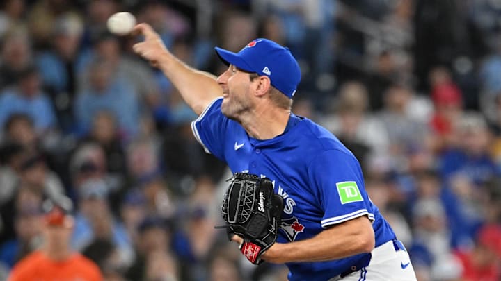 Mar 29, 2025; Toronto, Ontario, CAN; Toronto Blue Jays starting pitcher Max Scherzer (31) delivers a pitch against the Baltimore Orioles in the second inning at Rogers Centre. 