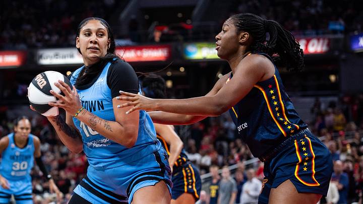 Jun 11, 2026; Indianapolis, Indiana, USA; Chicago Sky center Kamilla Cardoso (10) holds the ball while Indiana Fever center-forward Aliyah Boston (7) defends in the first half at Gainbridge Fieldhouse. Mandatory Credit: Trevor Ruszkowski-Imagn Images