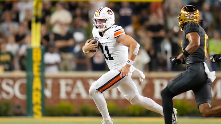 Aug 29, 2025; Waco, Texas, USA;  Auburn Tigers quarterback Jackson Arnold (11) runs the ball as Baylor Bears safety Tyler Turner (17) defends during the first half at McLane Stadium. Mandatory Credit: Chris Jones-Imagn Images Aug 29, 2025; Waco, Texas, USA;  Auburn Tigers quarterback Jackson Arnold (11) runs the ball as Baylor Bears safety Tyler Turner (17) defends during the first half at McLane Stadium. Mandatory Credit: Chris Jones-Imagn Images