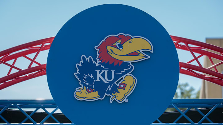 Oct 1, 2022; Lawrence, Kansas, USA; Kansas Jayhawks logo at entrance to the field prior to the game between the Kansas Jayhawks and the Iowa State Cyclones at David Booth Kansas Memorial Stadium. Mandatory Credit: William Purnell-Imagn Images