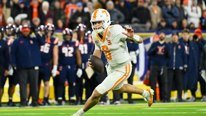 Dec 30, 2025; Nashville, TN, USA; Tennessee Volunteers quarterback Joey Aguilar (6) scrambles and runs for a touchdown against the Illinois Fighting Illini during the first half at Nissan Stadium. Mandatory Credit: Steve Roberts-Imagn Images Dec 30, 2025; Nashville, TN, USA; Tennessee Volunteers quarterback Joey Aguilar (6) scrambles and runs for a touchdown against the Illinois Fighting Illini during the first half at Nissan Stadium. Mandatory Credit: Steve Roberts-Imagn Images