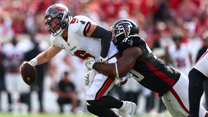 Tampa Bay Buccaneers QB Baker Mayfield getting sacked by an Atlanta Falcons defender. 