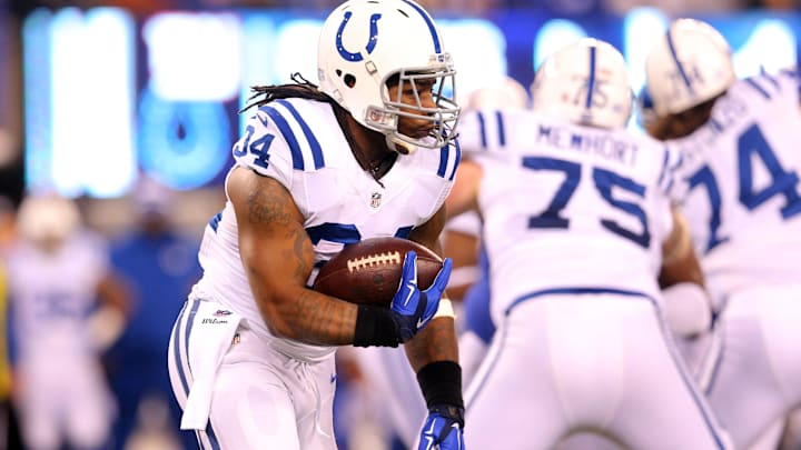Nov 3, 2014; East Rutherford, NJ, USA; Indianapolis Colts running back Trent Richardson (34) runs the ball against the New York Giants during the first quarter at MetLife Stadium. Mandatory Credit: Brad Penner-Imagn Images