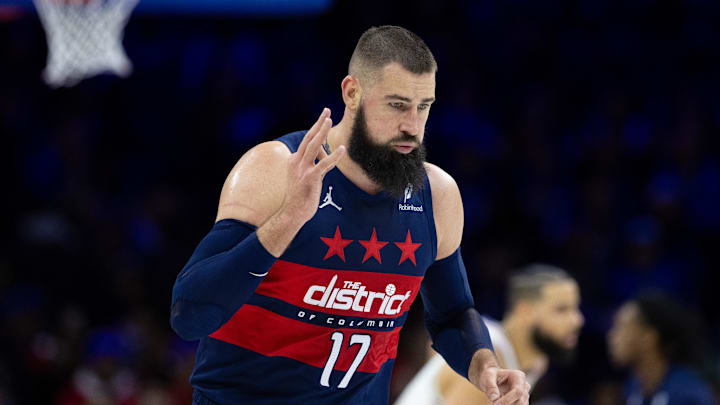 Jan 8, 2025; Philadelphia, Pennsylvania, USA; Washington Wizards center Jonas Valanciunas (17) reacts to his three pointer against the Philadelphia 76ers during the third quarter at Wells Fargo Center. Mandatory Credit: Bill Streicher-Imagn Images
