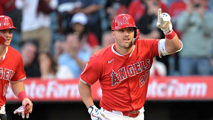 Apr 9, 2024; Anaheim, California, USA;  Los Angeles Angels outfielder Mike Trout (27) crosses the plate after hitting a two-run home run in the first inning against the Tampa Bay Rays at Angel Stadium. Mandatory Credit: Jayne Kamin-Oncea-Imagn Images