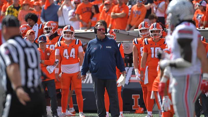 Oct 11, 2025; Champaign, Illinois, USA; Illinois Fighting Illini head coach Bret Bielema stands on the sidelines during the second quarter against the Ohio State Buckeyes at Memorial Stadium. Mandatory Credit: Ron Johnson-Imagn Images Oct 11, 2025; Champaign, Illinois, USA; Illinois Fighting Illini head coach Bret Bielema stands on the sidelines during the second quarter against the Ohio State Buckeyes at Memorial Stadium. Mandatory Credit: Ron Johnson-Imagn Images