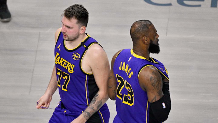 Apr 9, 2025; Dallas, Texas, USA; Los Angeles Lakers guard Luka Doncic (77) and forward LeBron James (23) during the game between the Dallas Mavericks and the Los Angeles Lakers at American Airlines Center. Mandatory Credit: Jerome Miron-Imagn Images