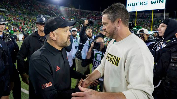 Oregon Ducks head coach Dan Lanning, right, and Nebraska Cornhuskers head coach Matt Rhule shake hands as the Oregon Ducks host the Nebraska Cornhuskers on Oct. 17, 2026, at Autzen Stadium in Eugene, Oregon.