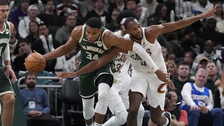 Nov 2, 2024; Milwaukee, Wisconsin, USA; Milwaukee Bucks forward Giannis Antetokounmpo (34)and Cleveland Cavaliers forward Evan Mobley (4) get tangled up in the second half at Fiserv Forum. Mandatory Credit: Michael McLoone-Imagn Images Nov 2, 2024; Milwaukee, Wisconsin, USA; Milwaukee Bucks forward Giannis Antetokounmpo (34)and Cleveland Cavaliers forward Evan Mobley (4) get tangled up in the second half at Fiserv Forum. Mandatory Credit: Michael McLoone-Imagn Images