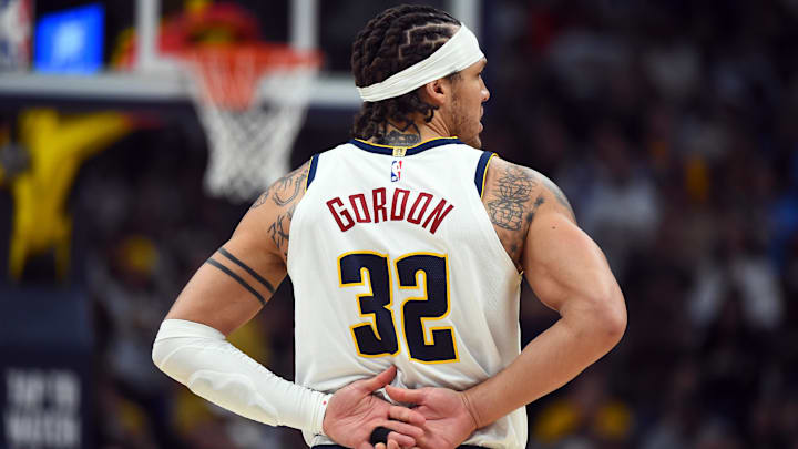 Apr 18, 2026; Denver, Colorado, USA; Denver Nuggets forward Aaron Gordon (32) holds his back after a play during the second half against the Minnesota Timberwolves in game one of the first round of the 2026 NBA Playoffs at Ball Arena. Mandatory Credit: Christopher Hanewinckel-Imagn Images