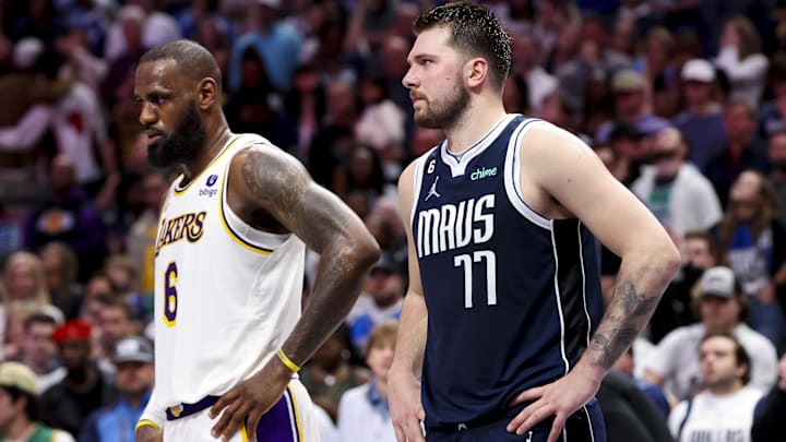 Los Angeles Lakers forward LeBron James (6) and Dallas Mavericks guard Luka Doncic.