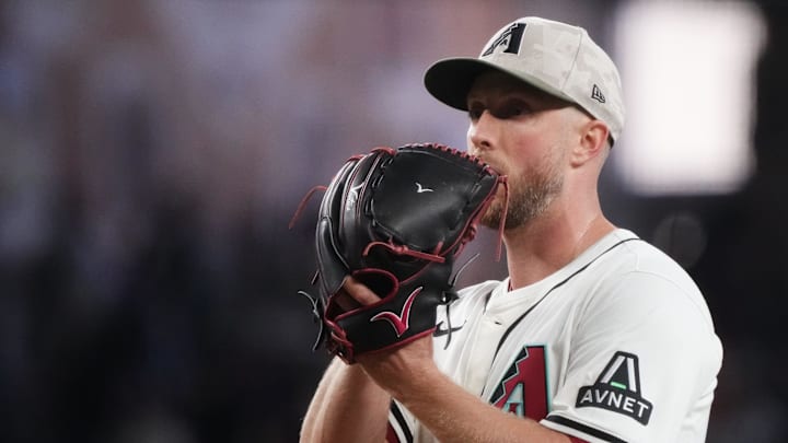 May 18, 2025; Phoenix, Ariz., U.S.; Arizona Diamondbacks Merrill Kelly (29) pitches against the Colorado Rockies at Chase Field in Phoenix on May 18, 2025. May 18, 2025; Phoenix, Ariz., U.S.; Arizona Diamondbacks Merrill Kelly (29) pitches against the Colorado Rockies at Chase Field in Phoenix on May 18, 2025.