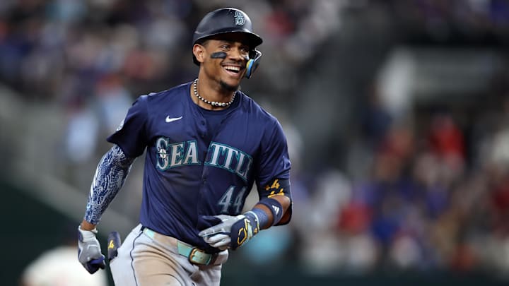 Seattle Mariners center fielder Julio Rodriguez reacts after hitting a home run against the Texas Rangers on Sept. 20 at Globe Life Field.