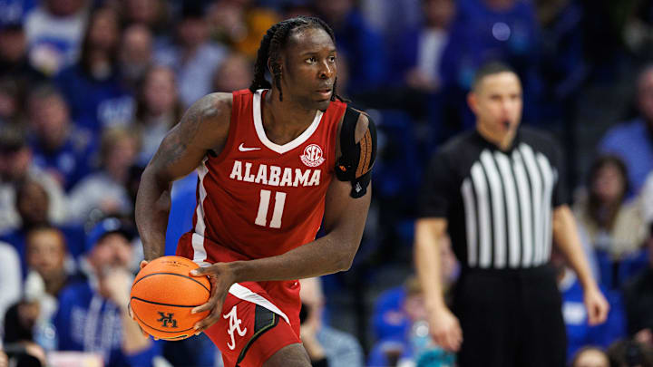 Jan 18, 2025; Lexington, Kentucky, USA; Alabama Crimson Tide center Clifford Omoruyi (11) handles the ball during the second half against the Kentucky Wildcats at Rupp Arena at Central Bank Center. Mandatory Credit: Jordan Prather-Imagn Images