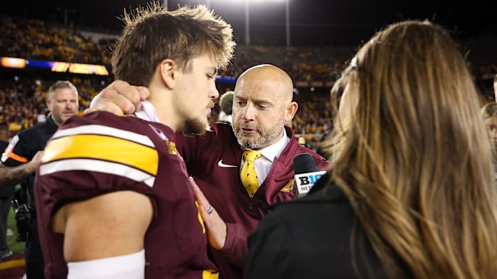 Oct 11, 2025; Minneapolis, Minnesota, USA; Minnesota Golden Gophers head coach P.J. Fleck and defensive back Koi Perich (3) are interviewed after the game against the Purdue Boilermakers at Huntington Bank Stadium. Mandatory Credit: Matt Krohn-Imagn Images