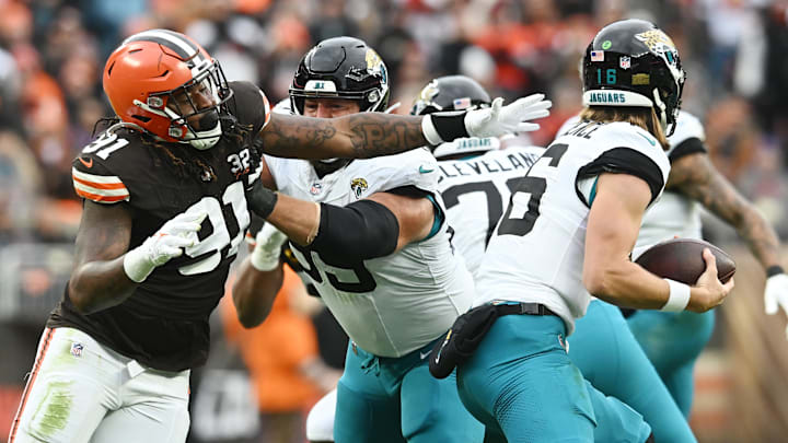 Dec 10, 2023; Cleveland, Ohio, USA; Cleveland Browns defensive end Alex Wright (91) rushes