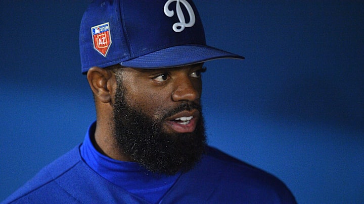 Mar 10, 2018; Phoenix, AZ, USA;  Los Angeles Dodgers left fielder Andrew Toles (60) looks on prior to facing the Chicago Cubs at Camelback Ranch. Mandatory Credit: Joe Camporeale-Imagn Images