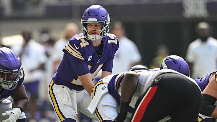 Sep 22, 2024; Minneapolis, Minnesota, USA; Minnesota Vikings quarterback Sam Darnold (14) in action against the Houston Texans during the game at U.S. Bank Stadium. Mandatory Credit: Jeffrey Becker-Imagn Images