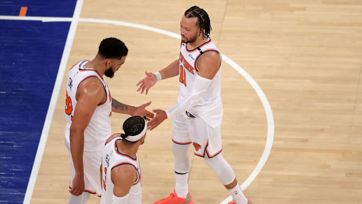 May 29, 2025; New York, New York, USA; New York Knicks guard Jalen Brunson (11) and center Karl-Anthony Towns (32) and guard Josh Hart (3) react in the fourth quarter against the Indiana Pacers during game five of the eastern conference finals for the 2025 NBA Playoffs at Madison Square Garden. Mandatory Credit: Brad Penner-Imagn Images